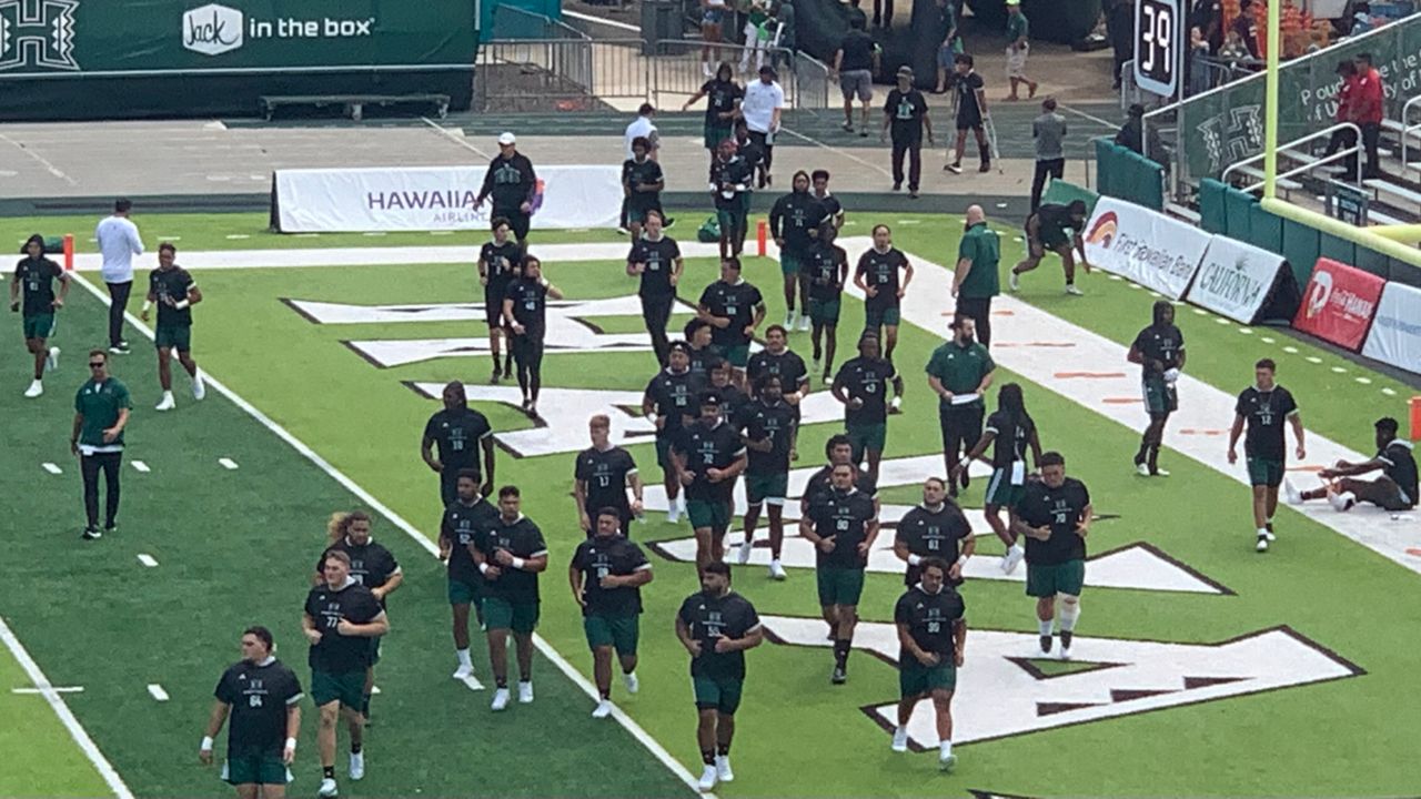 The Hawaii football team came out of its tunnel onto the Clarence T.C. Ching Athletics Complex field for warmups for the Vanderbilt game.