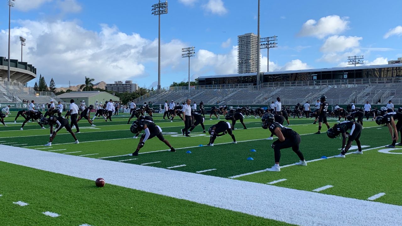 The Hawaii football team warmed up for a game at the Clarence T.C. Ching Athletics Complex in November 2021.