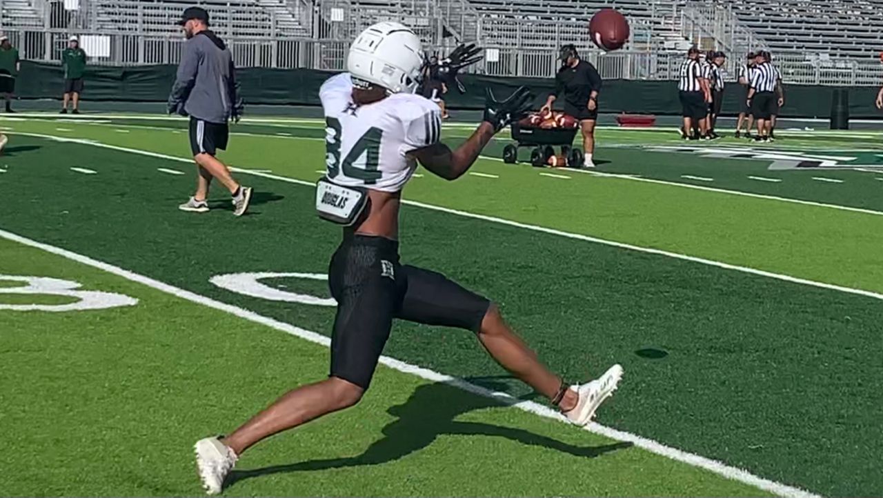 Hawaii freshman wide receiver Chuuky Hines caught a ball during drills at the Clarence T.C. Ching Athletics Complex.