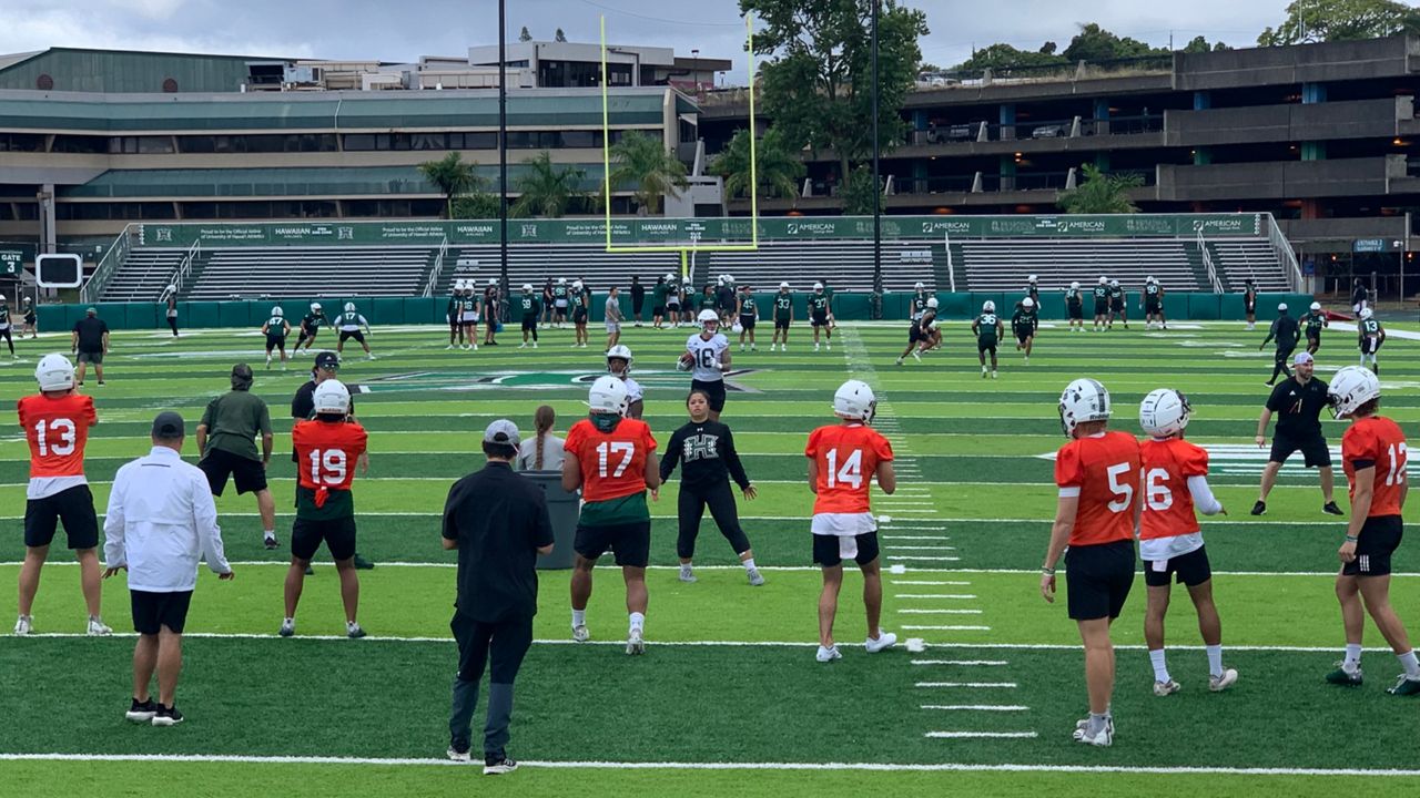 Hawaii quarterbacks went through a passing drill in spring camp.