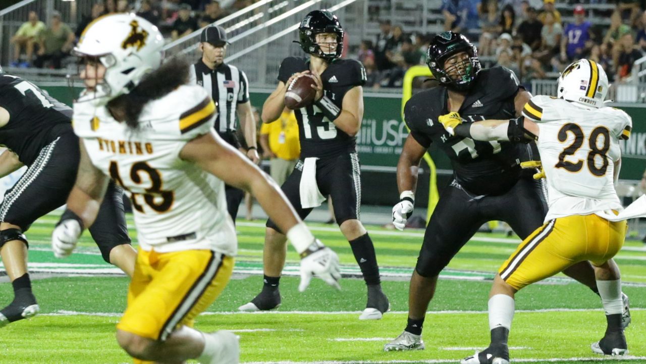 Quarterback Brayden Schager and the Hawaii football team, seen against Wyoming on Oct. 29, will play against the Cowboys in Laramie on Nov. 18 in the full 2023 schedule announced Thursday.