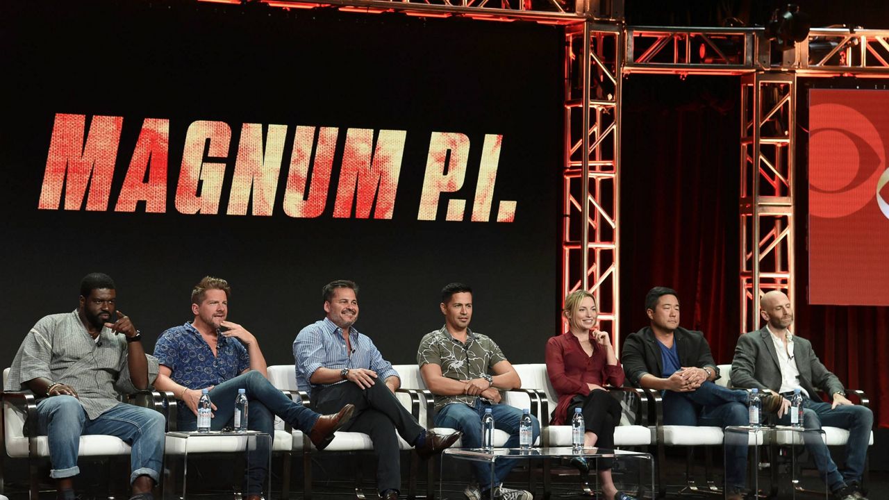 Stephen Hill, from left, Zachary Knighton, Peter M Lenkov, Jay Hernandez, Perdita Weeks, Tim Kang and Eric Guggenheim participate in the "Magnum P.I" panel during the Television Critics Association Summer Press Tour at the the Beverly Hilton Hotel on Sunday, Aug. 5, 2018, in Beverly Hills, Calif. (Photo by Richard Shotwell/Invision/AP)