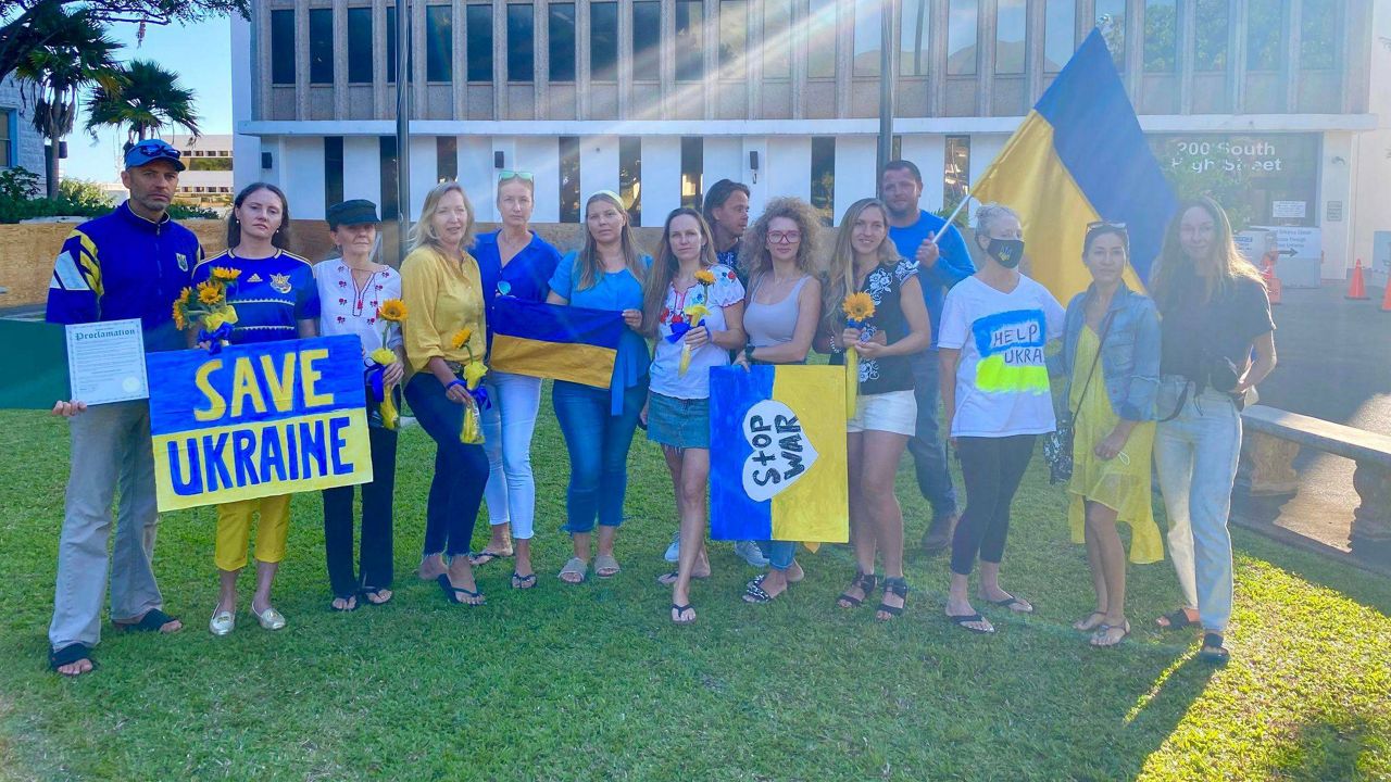 Yuliya LaBrosse (second from left) poses with people who gathered for Ukraine Solidarity Day on March 2. (Credit: Martina Hromadkova)