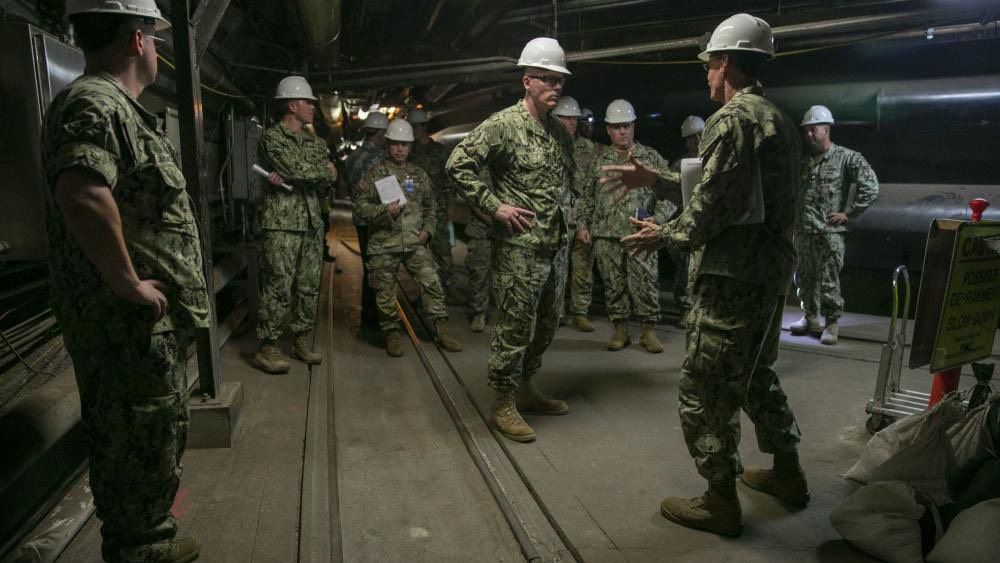 Rear Adm. John Wade (center) tours Red Hill Bulk Fuel Storage Facility. (Photo courtesy of the U.S. Navy)