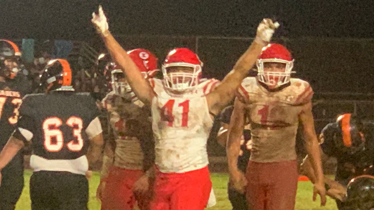 Kahuku football bogs down Campbell in OIA Open mud bowl