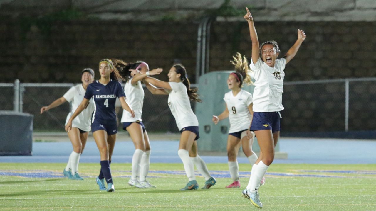 Punahou midfielder Ellie Gusman, right, raised a finger in triumph as time expired on the Buffanblu's 3-0 win over Kamehameha in the HHSAA Division I championship.