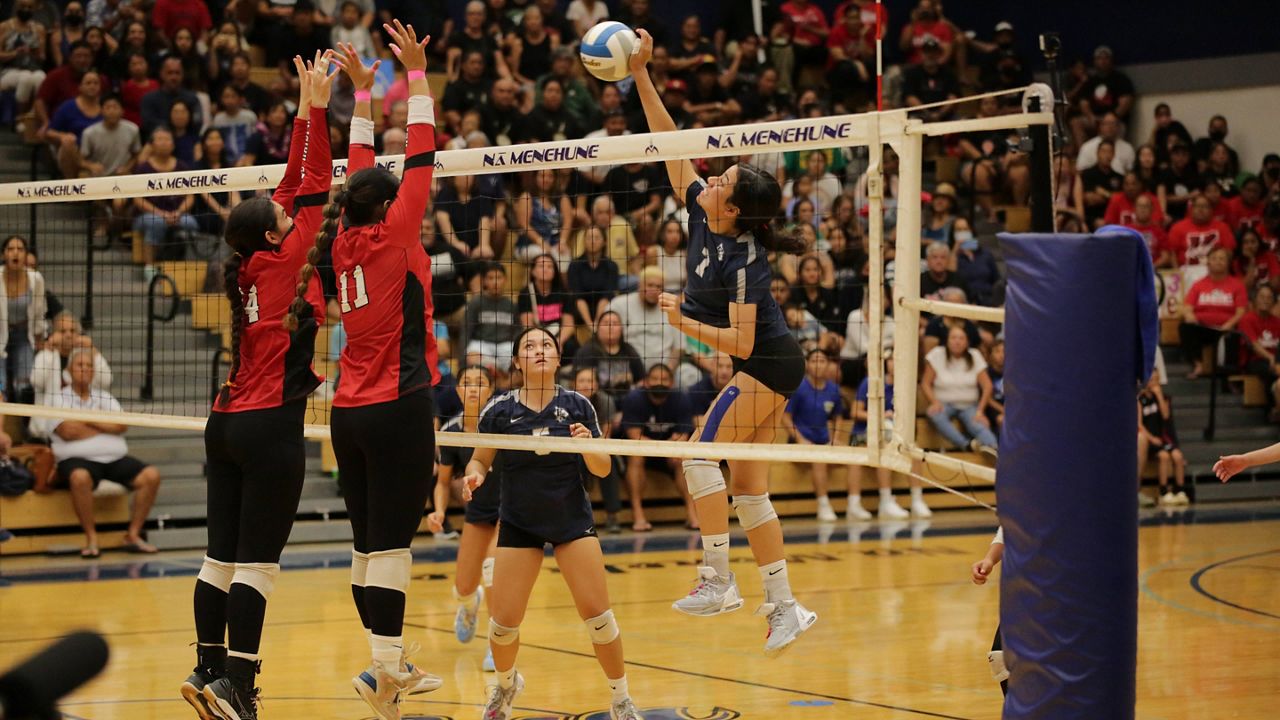 Kamehameha-Hawaii's Kilinoelehua Helm attacked the block of Kahuku during the five-set marathon between the teams Thursday night at Moanalua.