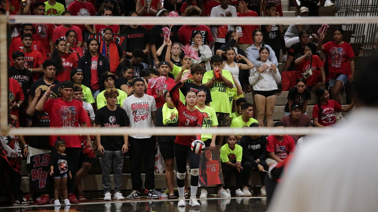 Kahuku's Cha'lei Reid faced down three match points on her serve to keep the Red Raiders alive for an OIA volleyball title against Mililani on Wednesday night. (Spectrum News/Brian McInnis)