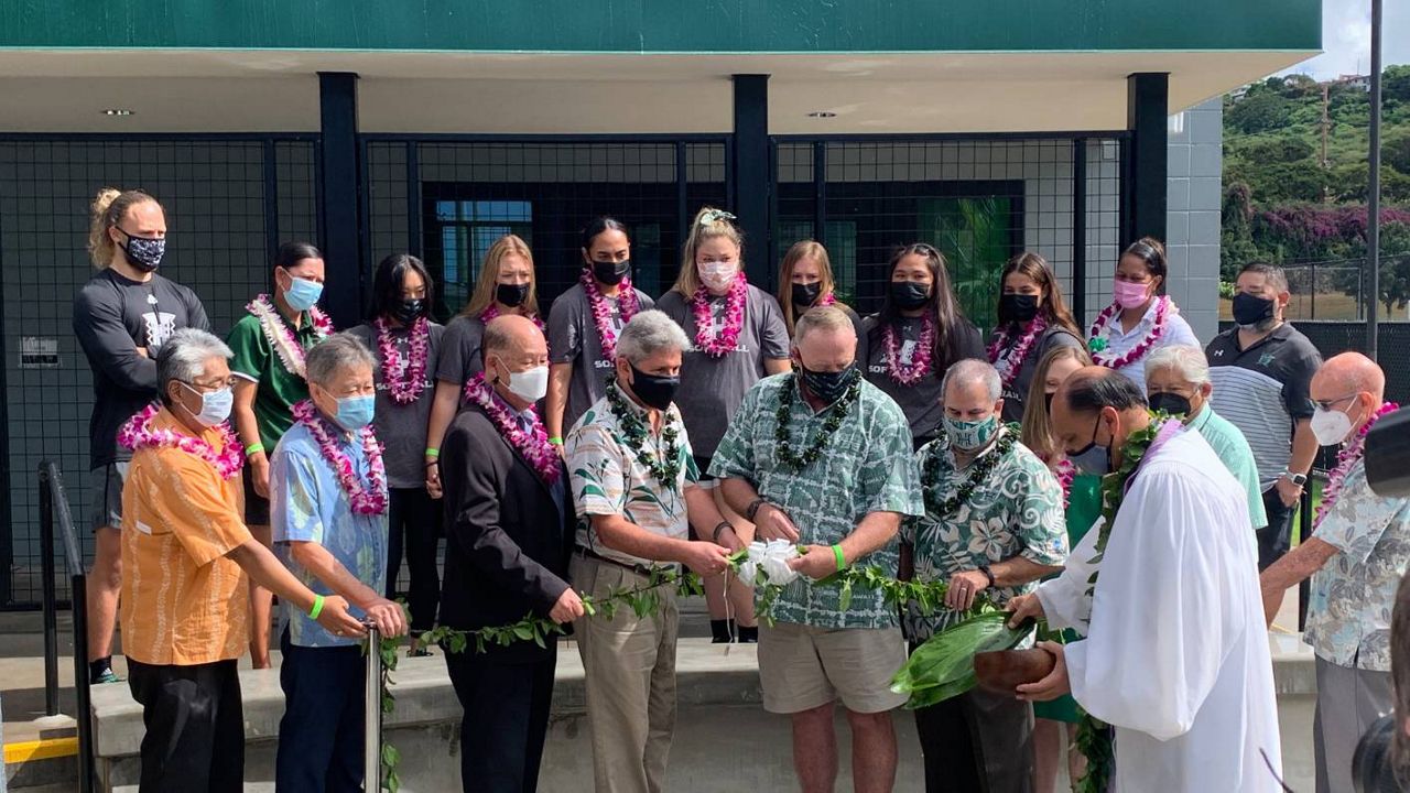 University of Hawaii administrators and state lawmakers joined UH softball coach Bob Coolen and players for a Hawaiian blessing at the opening of UH's new clubhouse at Rainbow Wahine Softball Stadium.