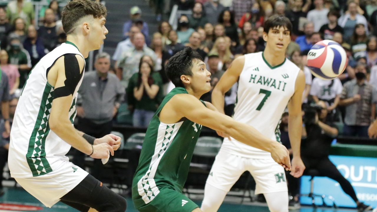 Hawaii libero ‘Eleu Choy, middle, passed a ball between Dimitrios Mouchlias and Cole Hogland against Concordia Irvine on Thursday night at the Stan Sheriff Center. 