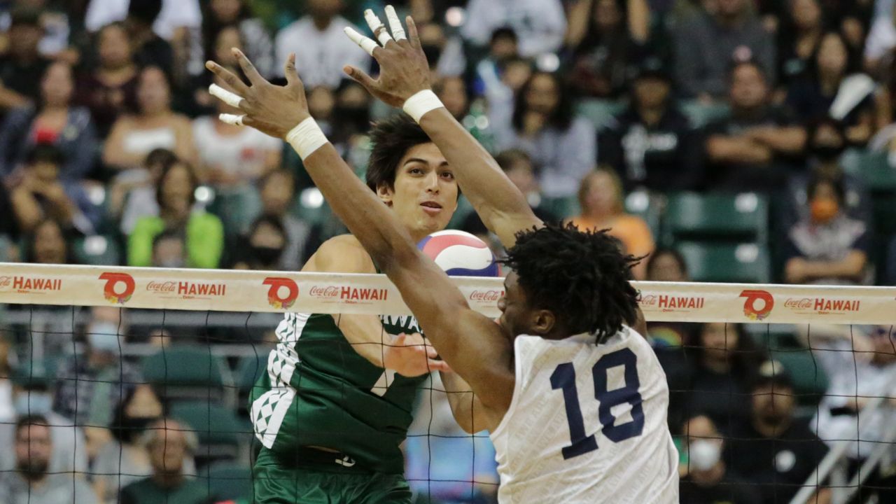 Hawaii middle Cole Hogland was blocked by Penn State's Toby Ezeonu in the second set of the Rainbow Warriors' four-set loss on Friday night.