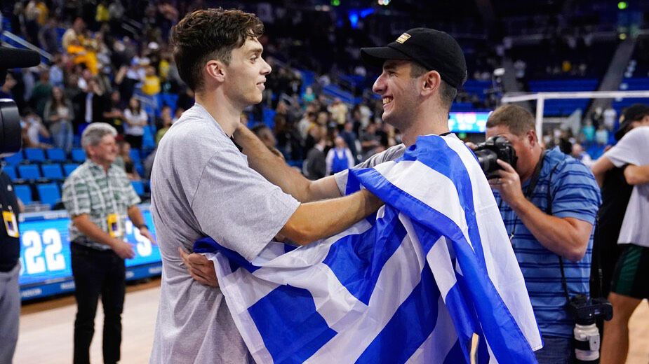 Hawaii men's volleyball standouts from Greece, Dimitrios Mouchlias, left, and Spyros Chakas celebrated after winning the NCAA championship over Long Beach State at UCLA on May 7. Both players are among UH's returning starting lineup in 2023.