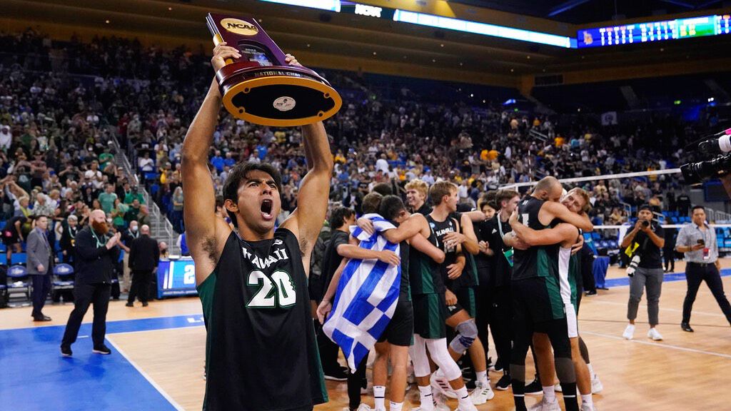 Keoni Thiim hoisted the NCAA men's volleyball national championship trophy after the Rainbow Warriors swept rival Long Beach State at Pauley Pavilion on May 7. It was one of the highlights of the state's 2022 sports calendar.