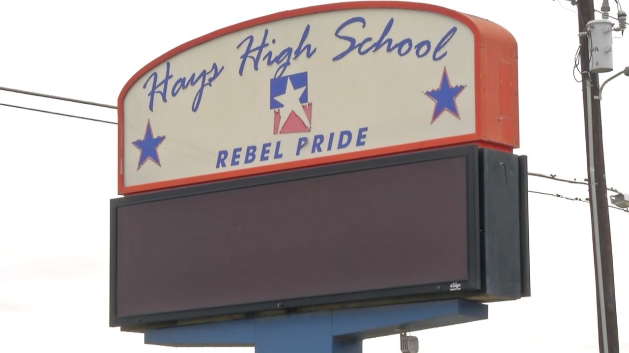 FILE - "Hays High School Rebel Pride" sign. (Spectrum News)