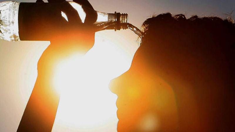 Pouring water on person