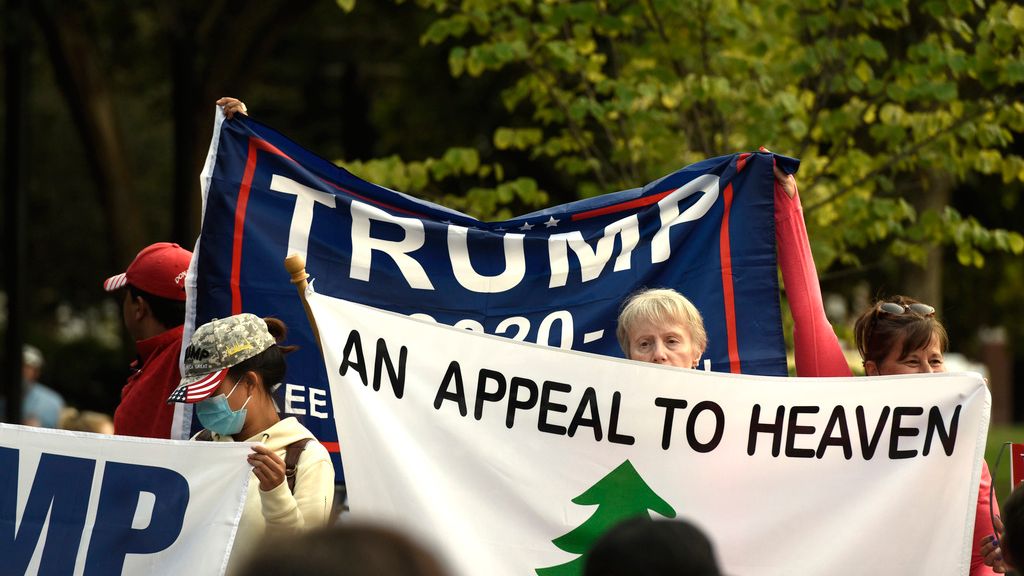 FILE - An Appeal To Heaven flag is pictured as people gather at Independence Mall to support President Donald Trump as he visits the National Constitution Center to participate in the ABC News town hall, Sept. 15, 2020, in Philadelphia. Supreme Court Justice Samuel Alito is embroiled in a second flag controversy, this time over the “Appeal to Heaven” flag, a banner that in recent years has come to symbolize Christian nationalism and the false claim that the 2020 presidential election was stolen. The flag was seen outside his New Jersey beach home last summer. (AP Photo/Michael Perez, File)