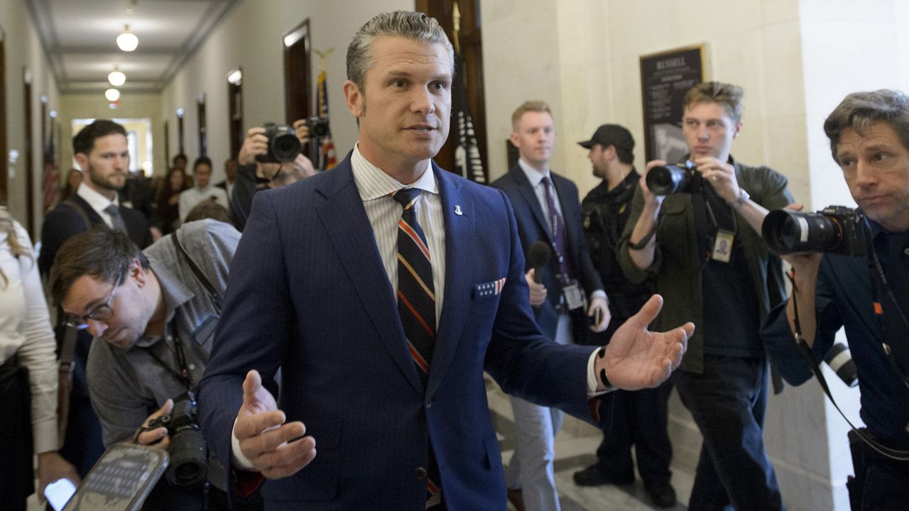 Pete Hegseth, President-elect Donald Trump's pick for secretary of defense, speaks with reporters following a meeting with senators on Capitol Hill, Nov. 21, 2024, in Washington. (AP Photo/Rod Lamkey, Jr., File)