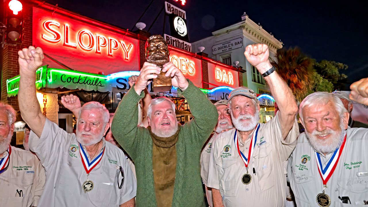 Gerrit Marshall hoists his trophy