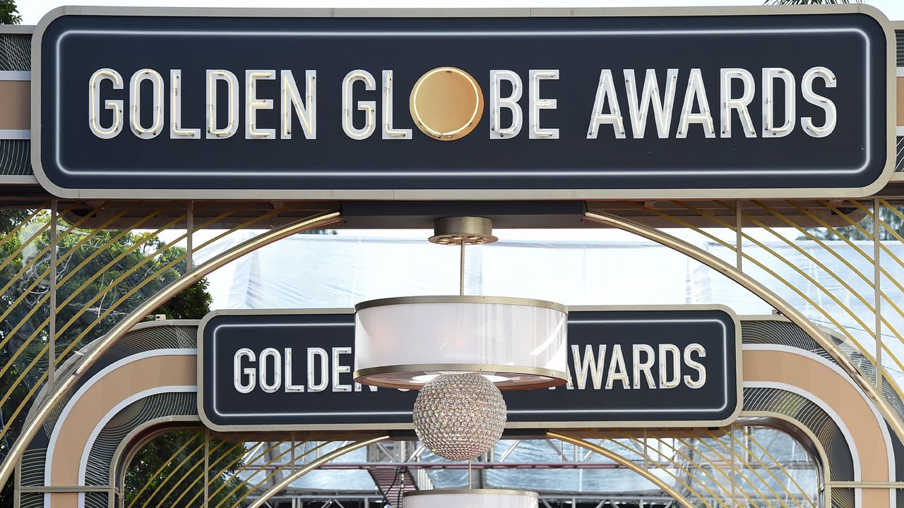 Event signage appears above the red carpet at the 77th annual Golden Globe Awards, on Jan. 5, 2020, in Beverly Hills, Calif. (Photo by Jordan Strauss/Invision/AP, File)