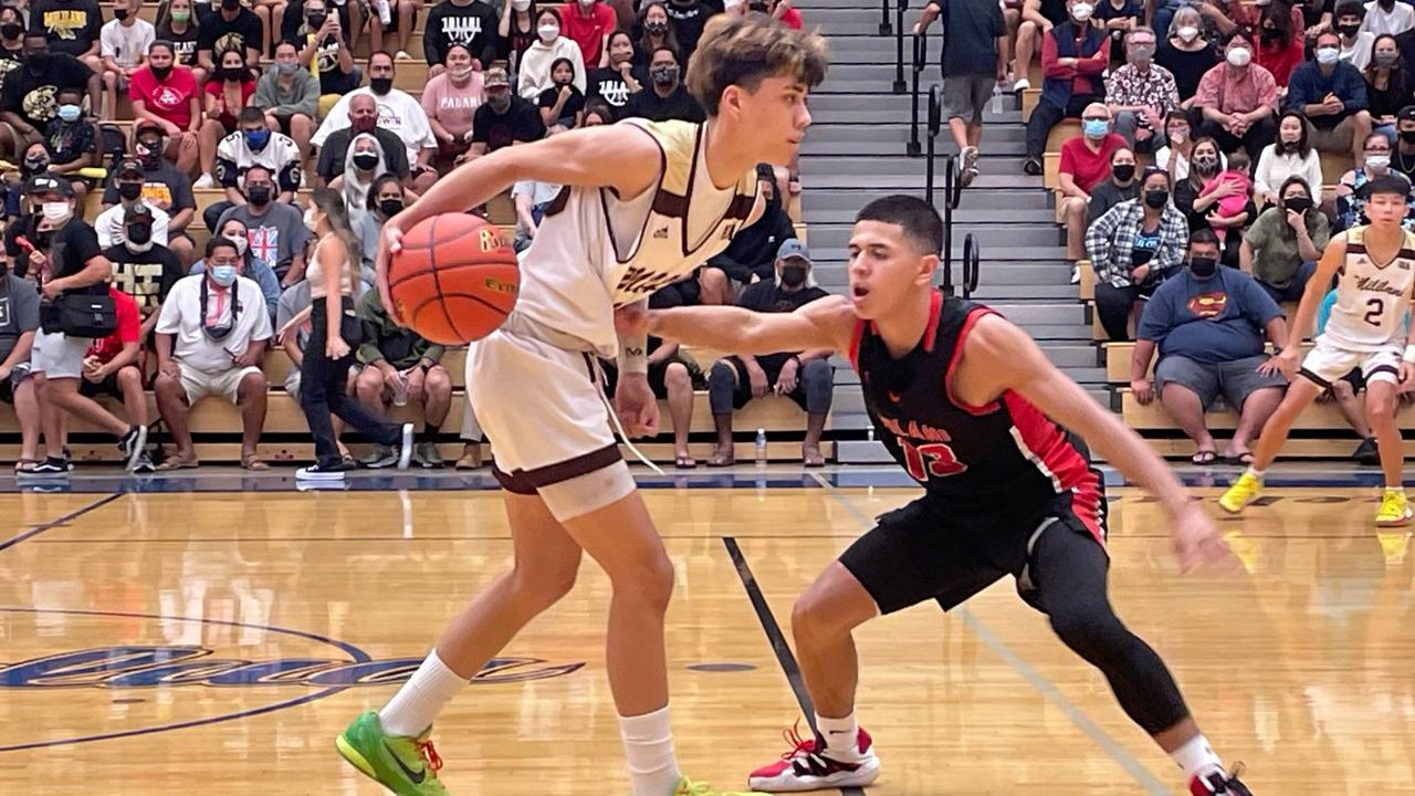 Mililani's J Marxen dribbled against Iolani's Bailey Bumanglag in the HHSAA Division I semifinals on Friday. 