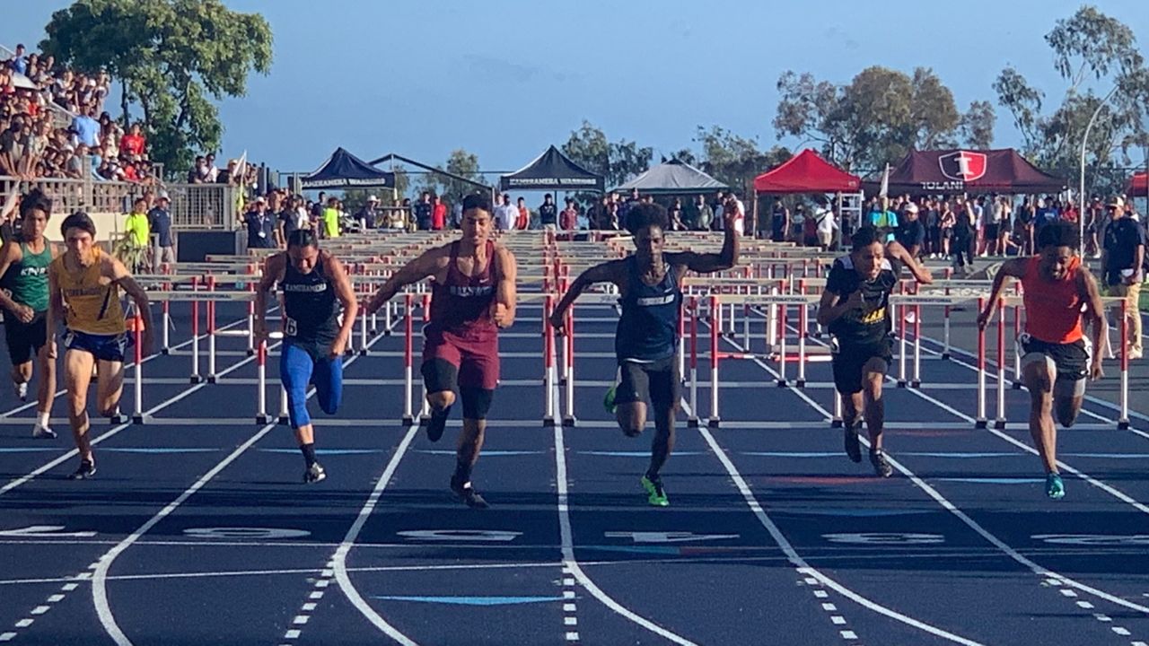 Boys 110 meter hurdles competitors raced to the finish line at Kamehameha's Kunuiakea Stadium on Saturday. Baldwin's Justin Kahalewai won in 15.59 seconds, edging Moanalua's Joshua Sanders at 15.65.