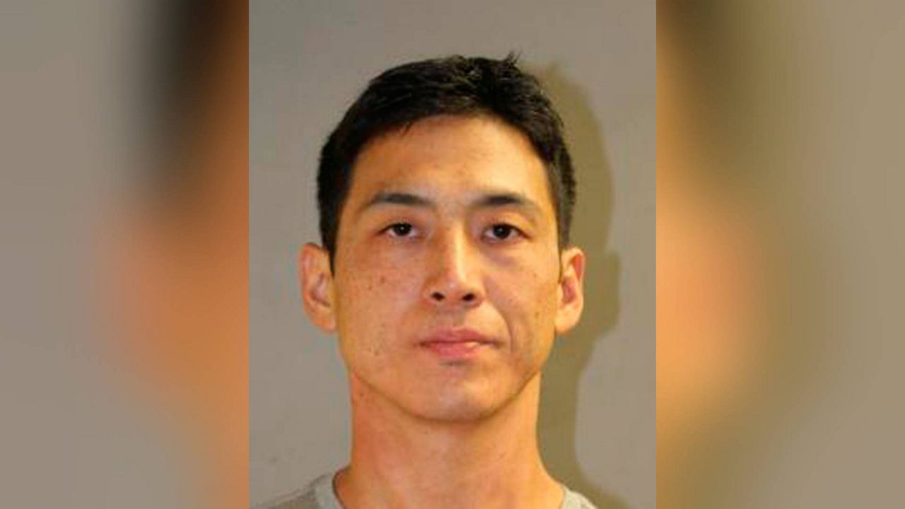 This undated photo released by the Honolulu Police Department shows Eric Thompson, charged with murder in the shooting death of the acupuncturist who was having an affair with his wife. A defense attorney told jurors at the start of Thompson's trial, that Thompson wasn't the only person with a motive to kill him. Jon Tokuhara “had a track record of cheating,” including with women who had families, Thompson's defense attorney said. (Honolulu Police Department via AP, File)