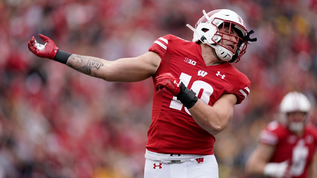 Wisconsin linebacker Nick Herbig (19) celebrates after forcing a fumble against Iowa that Wisconsin recovered during the first half of an NCAA college football game Saturday, Oct. 30, 2021, in Madison, Wis. Herbig is ready to lead a Wisconsin defense that must replace eight of its top 10 tacklers from last season. (AP Photo/Andy Manis, File)