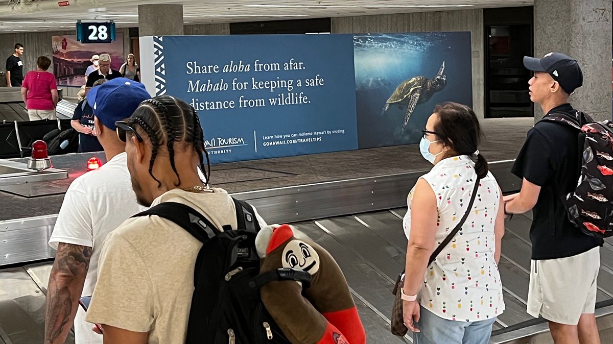 New messaging sharing the concept of malama and how to travel pono are on display at major island airports in Hawaii ahead of the expected summer travel season. (Hawaii Tourism Authority)