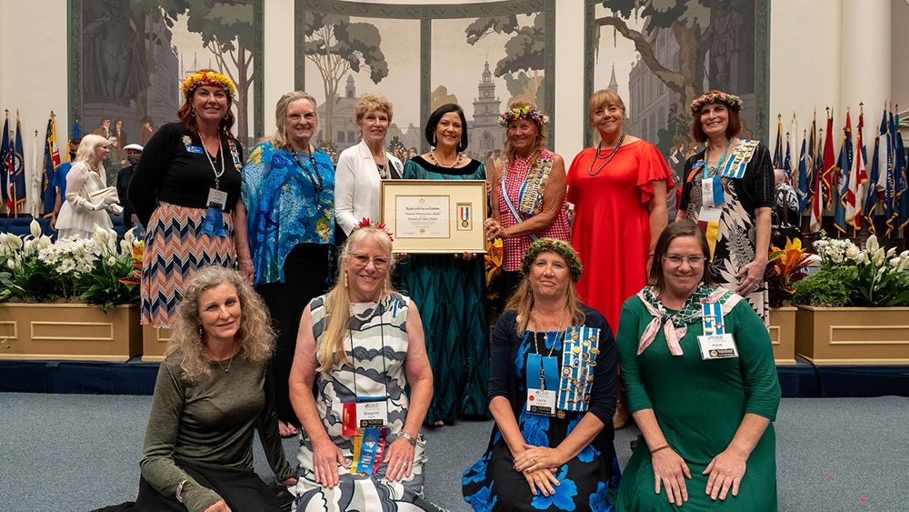 The Friends of Iolani Palace Executive Director Paula Akana (back row, center) along with a contingent from Hawaii received the Historic Preservation Award on July 1 in Washington, D.C. (The Friends of Iolani Palace)