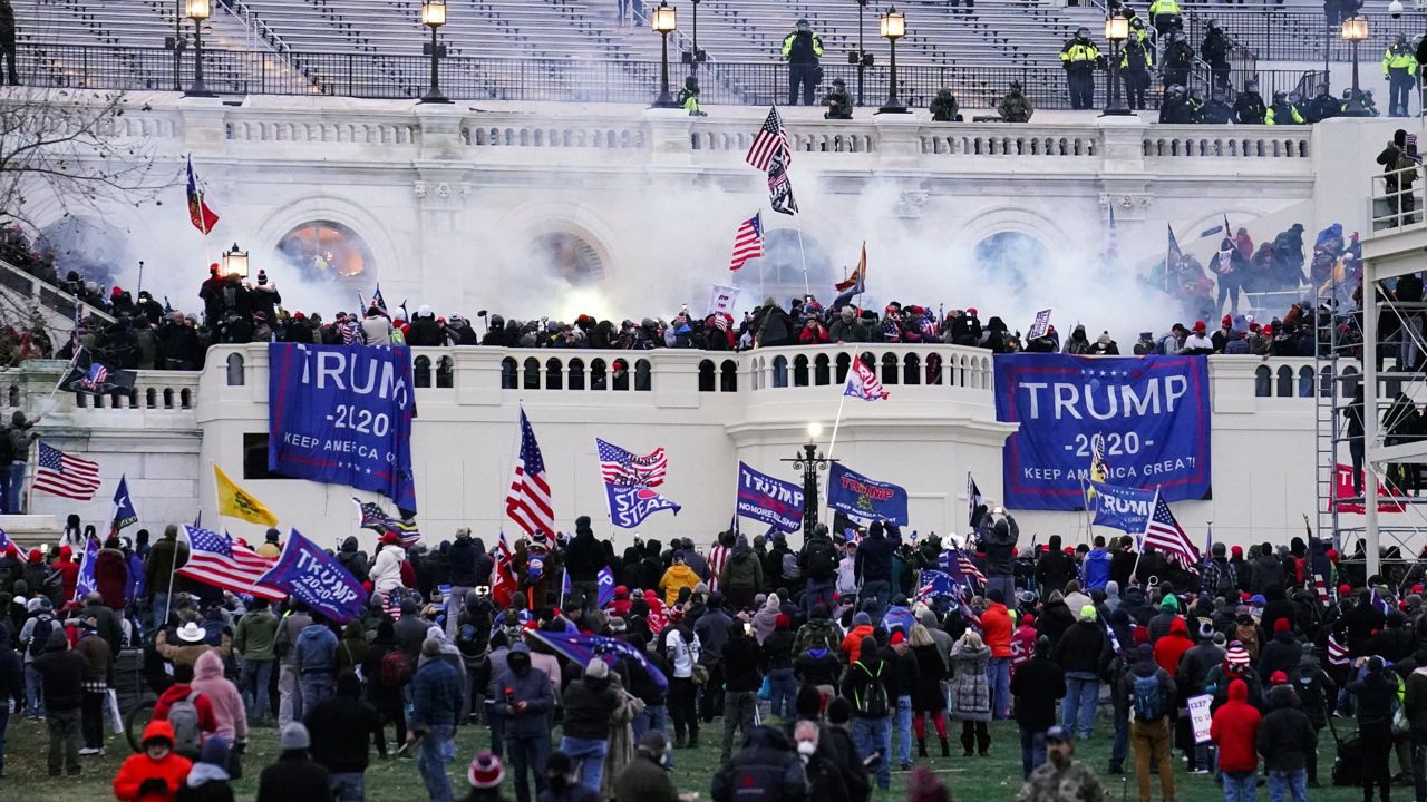 Rioters loyal to President Donald Trump storm the Capitol, Jan. 6, 2021, in Washington. (AP Photo/John Minchillo, File)