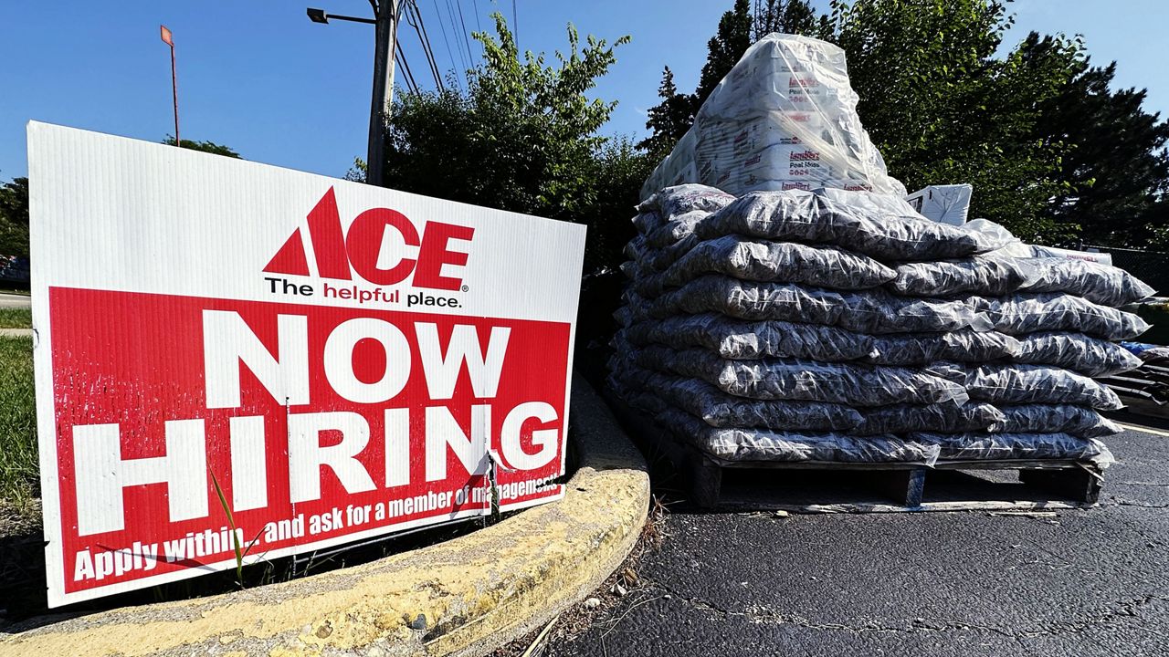 A hiring sign is displayed July 9 outside a hardware store in Buffalo Grove, Ill. (AP Photo/Nam Y. Huh)