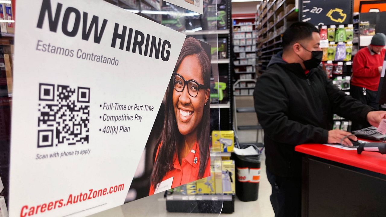 A hiring sign is displayed at a retail store in Buffalo Grove, Ill., on Feb. 10. (AP Photo/Nam Y. Huh)