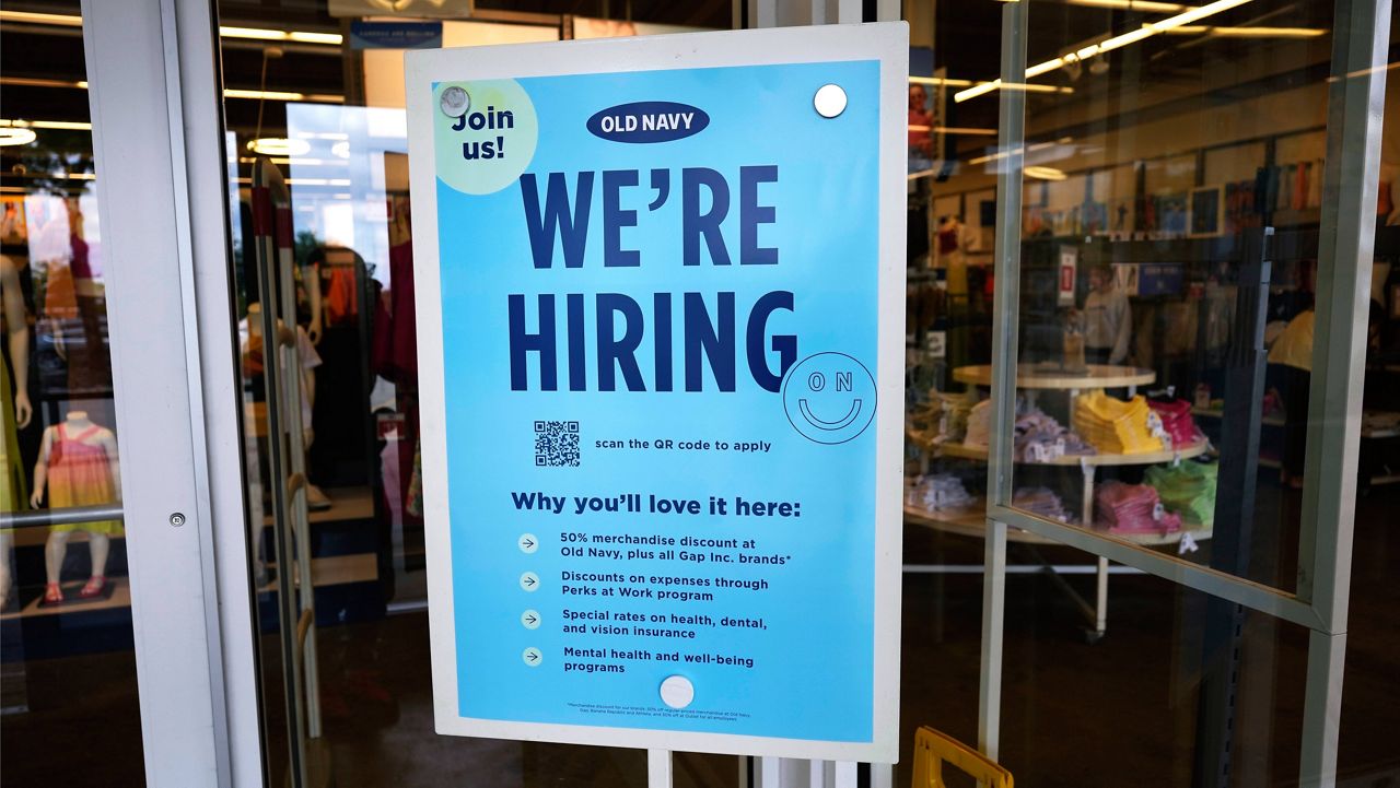 A hiring sign is displayed at a retail store in Vernon Hills, Ill., on June 12. (AP Photo/Nam Y. Huh)