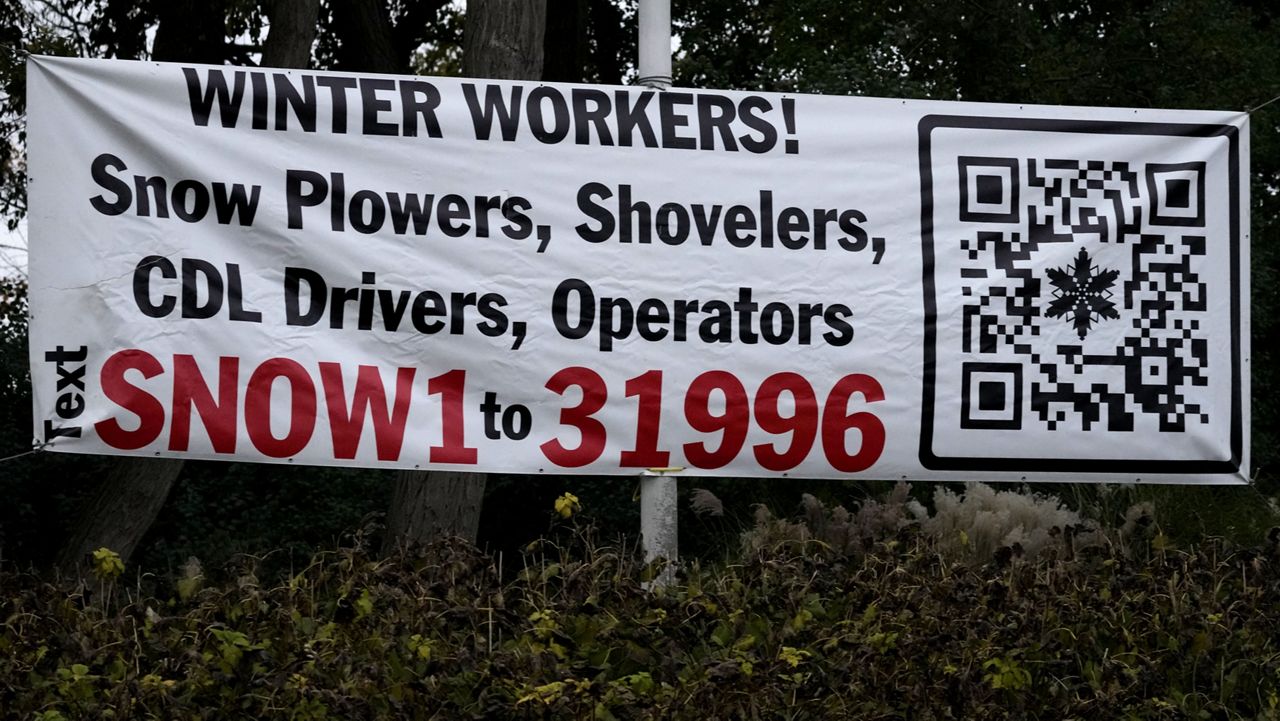 A hiring sign is displayed in Wheeling, Ill., Tuesday, Nov. 7, 2023. (AP Photo/Nam Y. Huh)