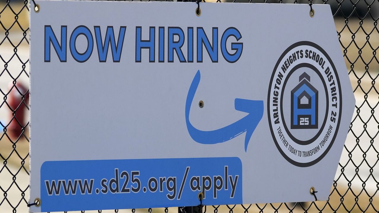 A hiring sign is displayed in Arlington Heights, Ill., Monday, Feb. 26, 2024. (AP Photo/Nam Y. Huh)