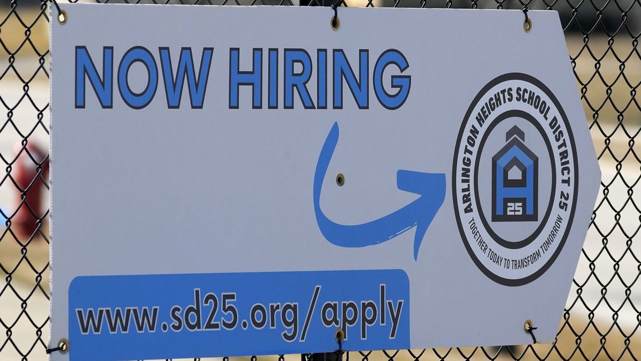 Applications for U.S. unemployment benefits dip to 210,000 in strong job market