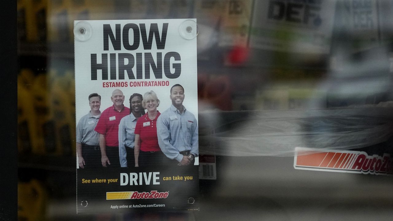 A hiring sign is displayed at a retail store in Buffalo Grove, Ill., Wednesday, Nov. 6, 2024. (AP Photo/Nam Y. Huh)