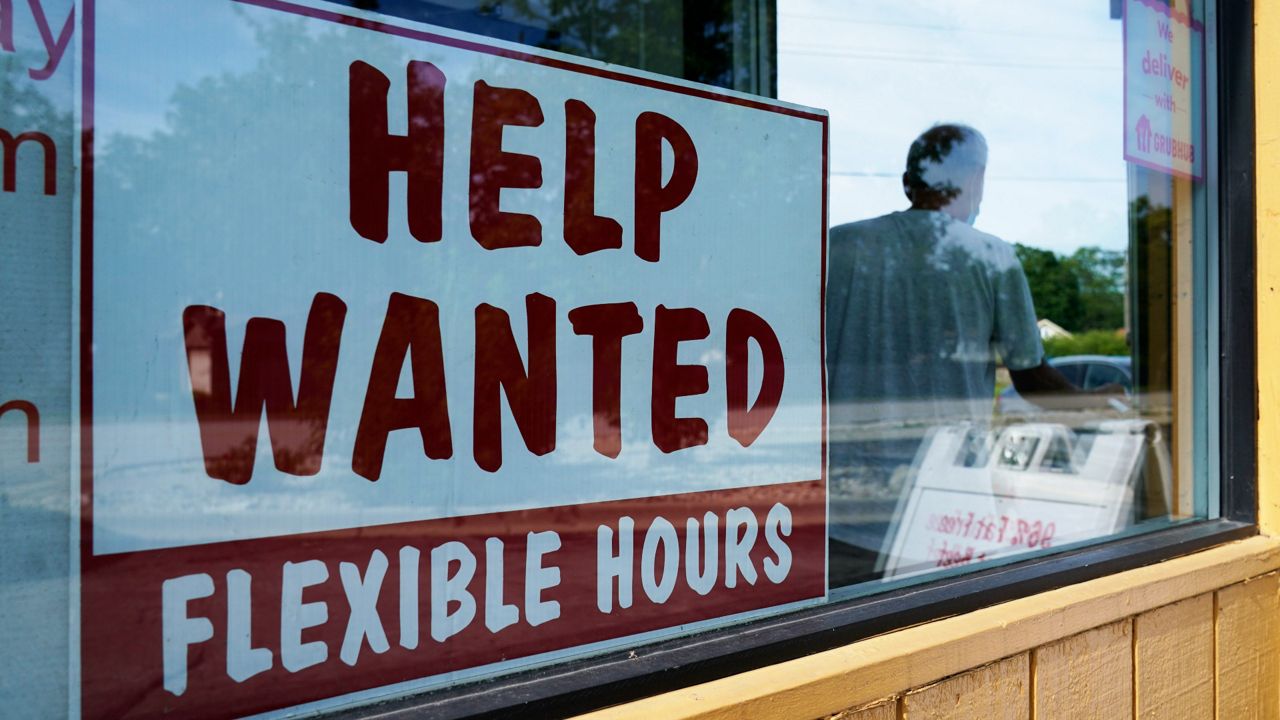 A "help wanted" sign is displayed in Deerfield, Ill., Wednesday, Sept. 21, 2022. (AP Photo/Nam Y. Huh)
