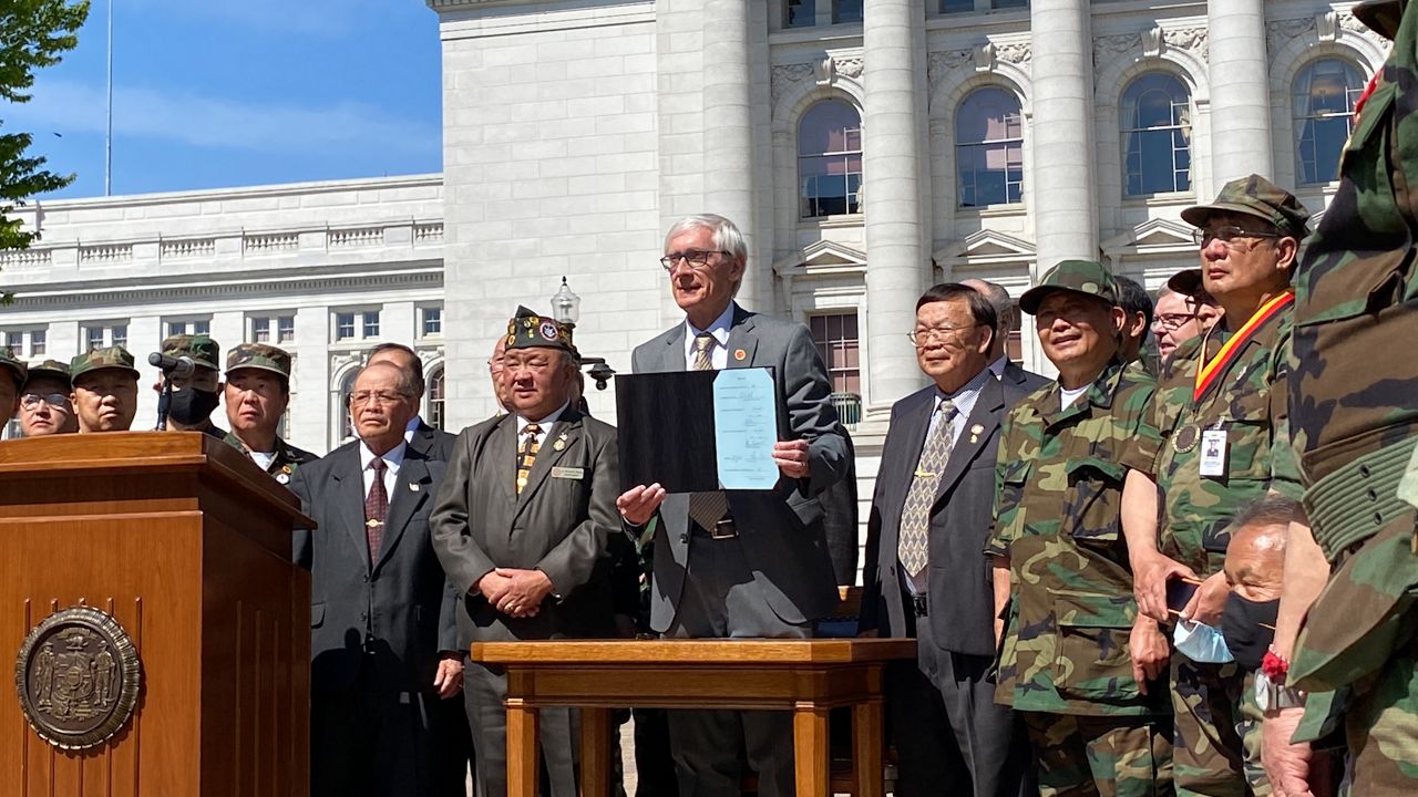 Gov. Tony Evers signs bill proclaiming May 14 Hmong-Lao Veterans Day in Wisconsin.