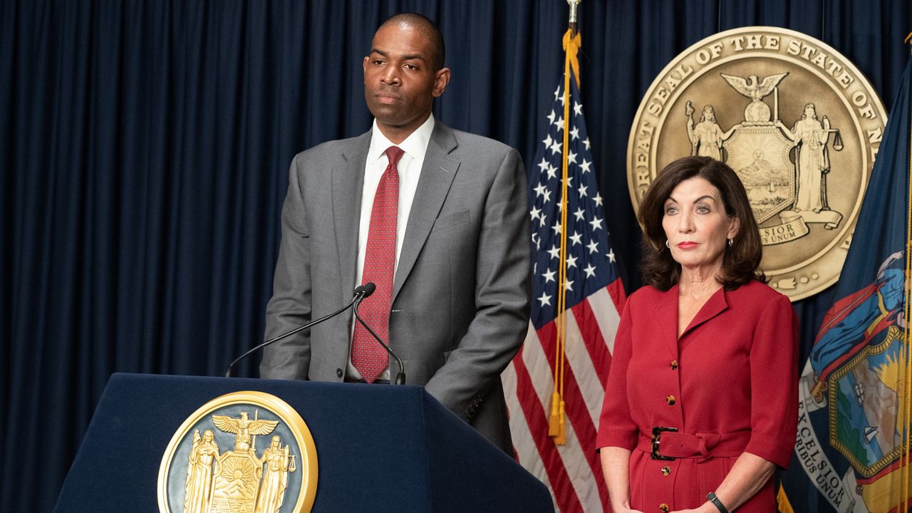 New York, United States. 27th June, 2022. Governor Kathy Hochul greets  young boy during campaign stop alone with Lieutenant Governor Antonio  Delgado in Washington Heights. Antonio Delgado is running for Lieutenant  Governor