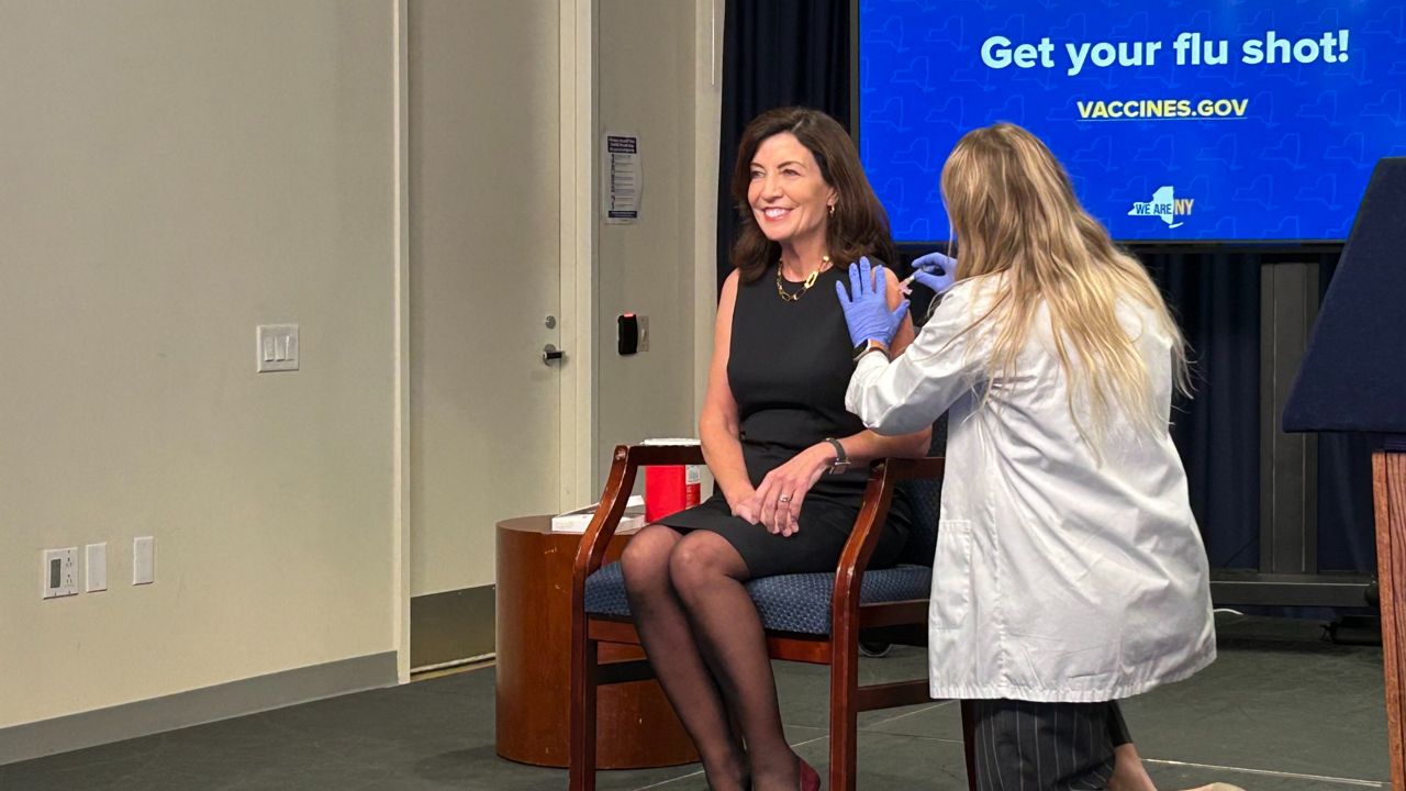 Gov. Kathy Hochul gets a flu shot on Wednesday, Oct. 26 in Manhattan. (NY1/Zack Fink)