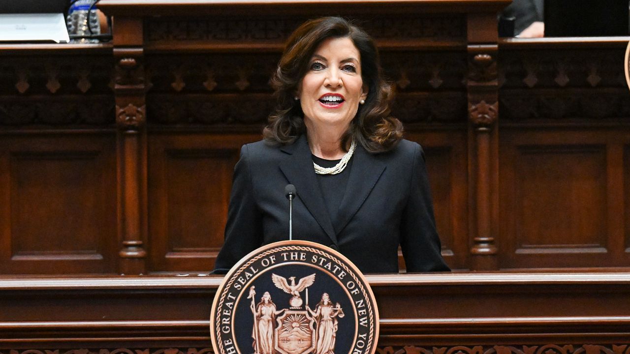 Gov. Kathy Hochul speaks in the Assembly Chamber on Tuesday.