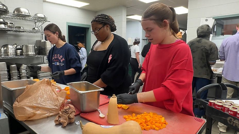 Students prepare meals to donate to those in need ahead of Thanksgiving for Wake Forest University's TurkeyPalooza. (Spectrum News 1/Sasha Strong)      