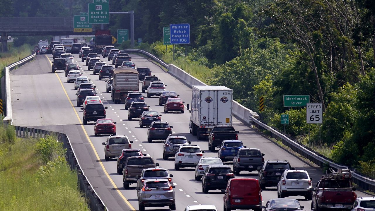 Drivers head south along Interstate 495, Friday, June 30, 2023, in Haverhill, Mass. (AP Photo/Charles Krupa)