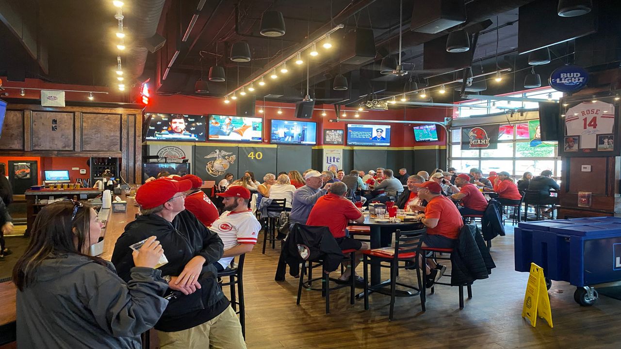 A crowd watching sports at Holy Grail bar