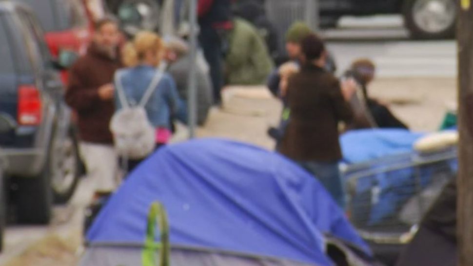 Homeless people camp along a sidewalk in this undated file image. (Spectrum News/FILE)