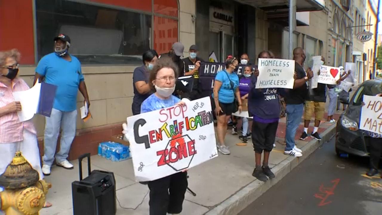 Rally calls for housing for Rochester's homeless