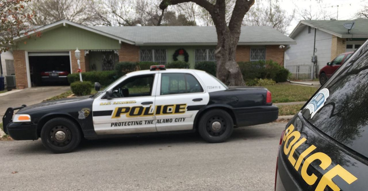 San Antonio Police Department vehicles at the scene of a woman's death on Monticello Court in this image from December 24, 2018. (John Salazar/Spectrum News)