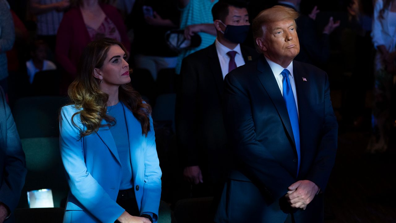 President Donald Trump attends church at International Church of Las Vegas with counselor Hope Hicks, left, Sunday, Oct. 18, 2020, in Las Vegas, Nev. Hicks, Trump's former spokeswoman, met Monday, March 6, 2023, with Manhattan prosecutors investigating hush-money payments made on the ex-president's behalf — the latest member of the Republican's inner circle to be questioned in the renewed probe. (AP Photo/Alex Brandon)