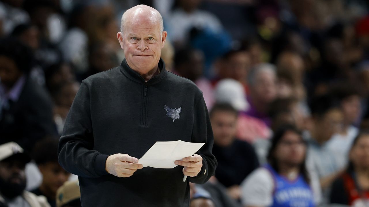 Charlotte Hornets head coach Steve Clifford watches his team play against the Los Angeles Clippers during the second half of an NBA basketball game in Charlotte, N.C., Sunday, March 31, 2024. (AP Photo/Nell Redmond)